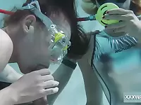 Horny scuba diver Minnie Manga gives nice blowjob right under water